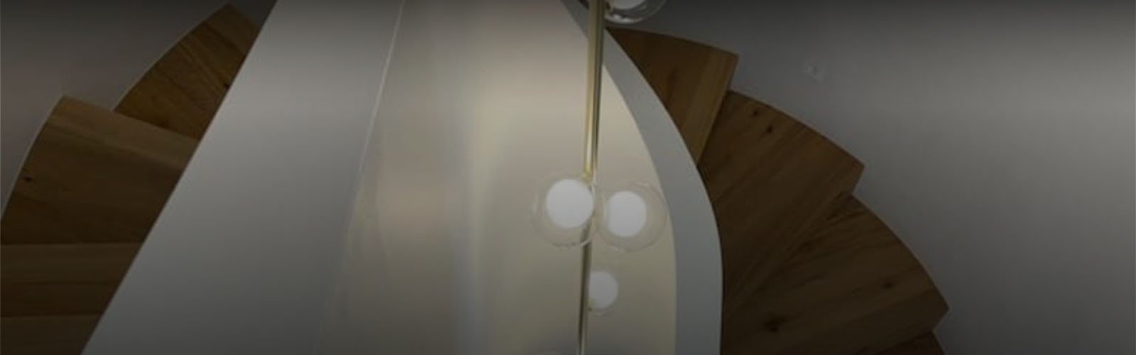 Blogs banner showing curved geometric timber staircase detail