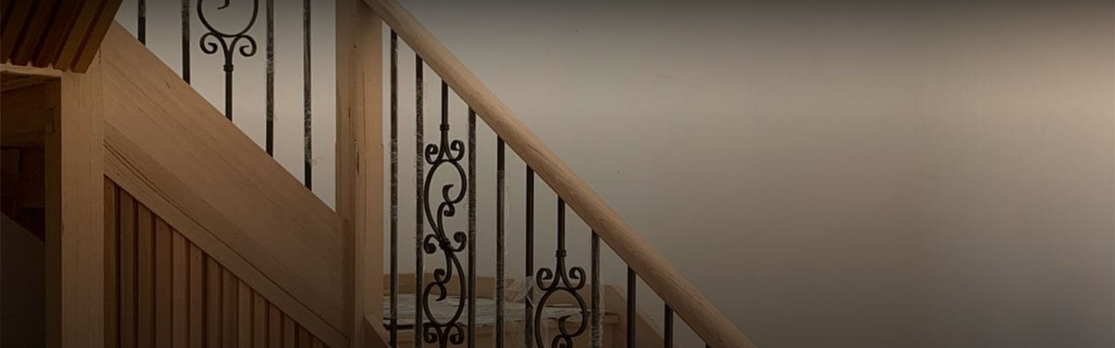 Projects banner showing decorative timber stair balustrade detail