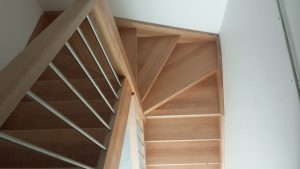 Renovated timber staircase with wire balustrade and timber handrail